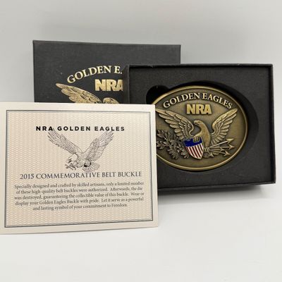 LOT 81: Two NRA Golden Eagles Commemorative Belt Buckles
