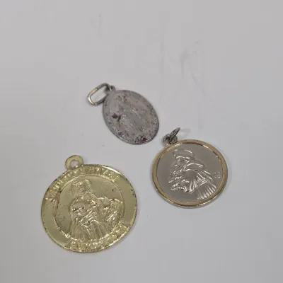 LOT 52: Statue Depicting the Infant Jesus of Prague, Multiple Scapulars, Italian-made Crucifix Pendant, and More