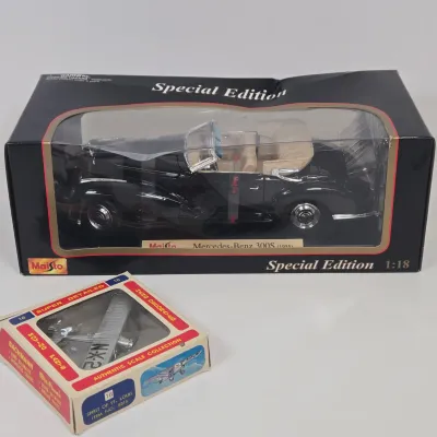 LOT 54: Maisto 1:18 Scale 1955 Mercedes-Benz 300S Die-Cast Special Edition Model and Vintage Bachmann Mini-Planes #16 Spirit of St. Louis