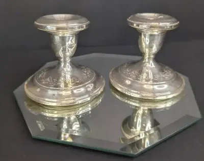 Pair of Weighted Sterling Silver Candlestick with Floral Design