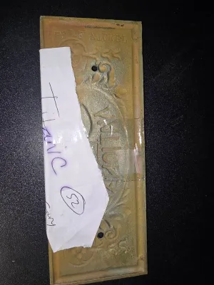 Sale Photo Thumbnail #121: The word "titanic" is written on the paper attached