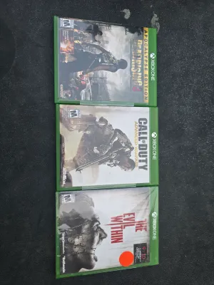 Sale Photo Thumbnail #335: 3 games the evil within is unopened