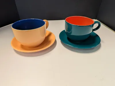 Pair Of Two Toned Coffee Cups w/ Saucers
