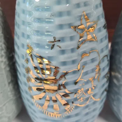LOT 132F: Large Collection of Antique Japanese Military Sake Cups, Four Sake Bottles, and Beautiful Wood Chest for Storage