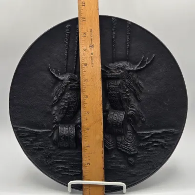LOT 48L: Heavy Cast-iron Japanese Decorative Plate Featuring a Relief Carving of Traditional Deer Dancers Performing the Shishimai or...