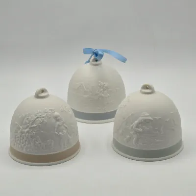LOT 44L: Three Matte Porcelain Bell Ornaments from the Vintage Lladró Four Seasons Collector’s Society Series
