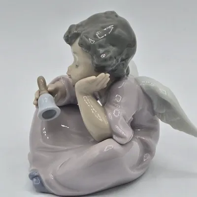 LOT 29L: Retired Lladro "Heavenly Chimes" Porcelain Figurine