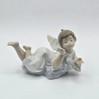 LOT 27L: Retired Lladró "Making a Wish" Angel Porcelain Figurine