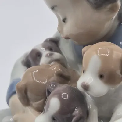 LOT 21L: Retired Lladró "New Playmates" Porcelain Figurine