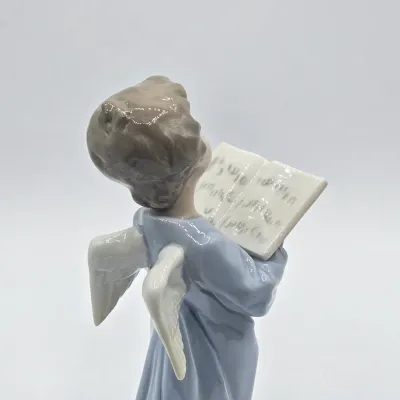 LOT 30L: Lladro "Angelic Voice" Porcelain Figurine