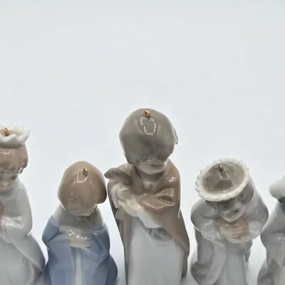 LOT 26L: Set of Retired Lladró Porcelain Nativity Ornaments Depicting the Holy Family and the Three Wise Men as Children