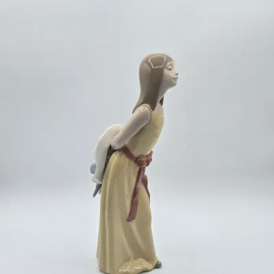 LOT 35L: Lladro "Naughty" Porcelain Figurine