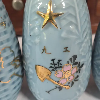 LOT 132F: Large Collection of Antique Japanese Military Sake Cups, Four Sake Bottles, and Beautiful Wood Chest for Storage