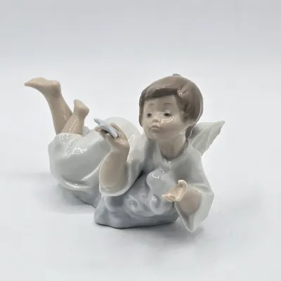 LOT 27L: Retired Lladró "Making a Wish" Angel Porcelain Figurine