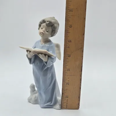 LOT 30L: Lladro "Angelic Voice" Porcelain Figurine