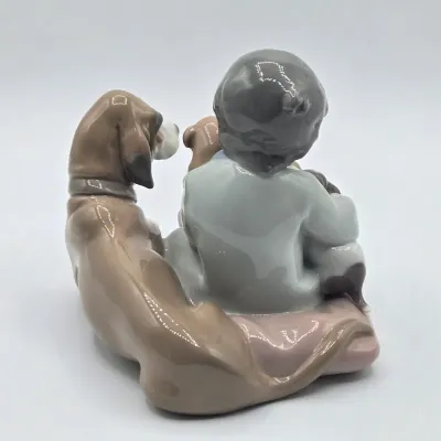 LOT 21L: Retired Lladró "New Playmates" Porcelain Figurine