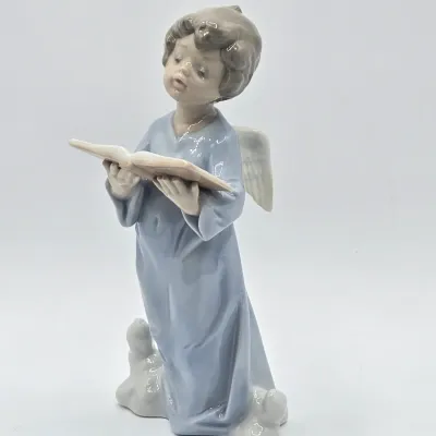 LOT 30L: Lladro "Angelic Voice" Porcelain Figurine