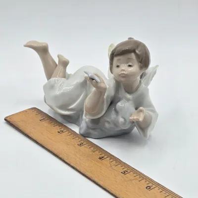 LOT 27L: Retired Lladró "Making a Wish" Angel Porcelain Figurine