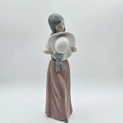 LOT 36L: Retired Lladró "Bashful Girl with Straw Hat" Porcelain Figurine