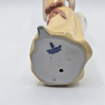 LOT 35L: Lladro "Naughty" Porcelain Figurine