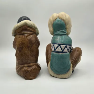 LOT 46L: Lladro "Artic Winter Girl" and "Poor Little Bear" Figurines