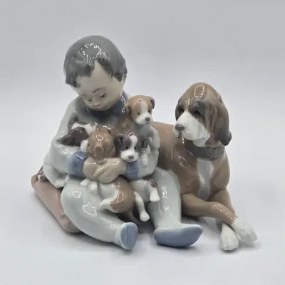 LOT 21L: Retired Lladró "New Playmates" Porcelain Figurine