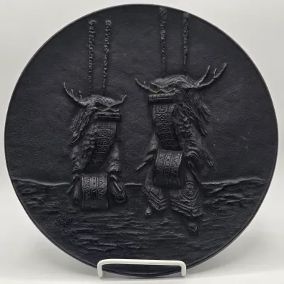 LOT 48L: Heavy Cast-iron Japanese Decorative Plate Featuring a Relief Carving of Traditional Deer Dancers Performing the Shishimai or...