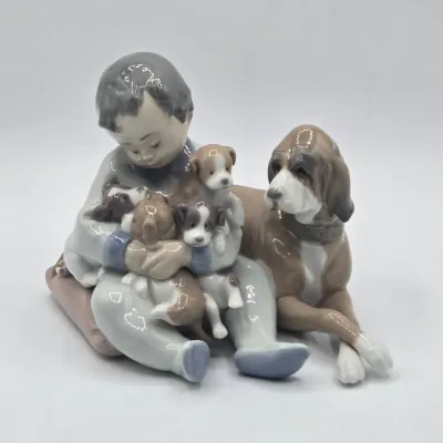 LOT 21L: Retired Lladró "New Playmates" Porcelain Figurine