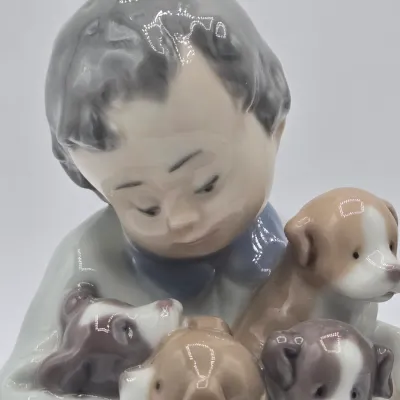 LOT 21L: Retired Lladró "New Playmates" Porcelain Figurine