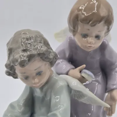 LOT 22L: Retired Lladró "Angel Care" Porcelain Figurine