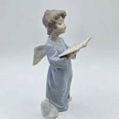 LOT 30L: Lladro "Angelic Voice" Porcelain Figurine