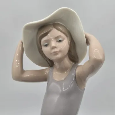 LOT 39L: Retired Lladró Porcelain Figurine Titled "Coy"