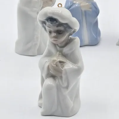 LOT 26L: Set of Retired Lladró Porcelain Nativity Ornaments Depicting the Holy Family and the Three Wise Men as Children