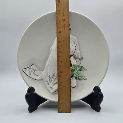 LOT 49L: Commemorative Ceramic Relief Decorative Plate Featuring a Jingu Bugaku Performer and Vintage Gourd-shaped Japanese Bell