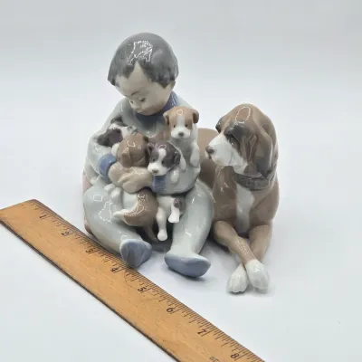 LOT 21L: Retired Lladró "New Playmates" Porcelain Figurine