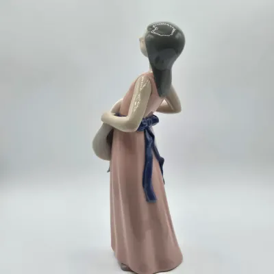 LOT 38L: Retired Lladró "The Dreamer" Porcelain Figurine