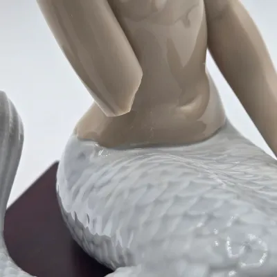 LOT 14L: DAMAGED /REPAIR Lot - Two Handcrafted Lladró Mermaid Figurines, Retired Lladró Geisha Porcelain Figurine, and Vintage 1985...