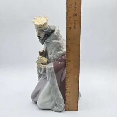 LOT 33L: King Gaspar Nativity Porcelain Figurine by Lladró