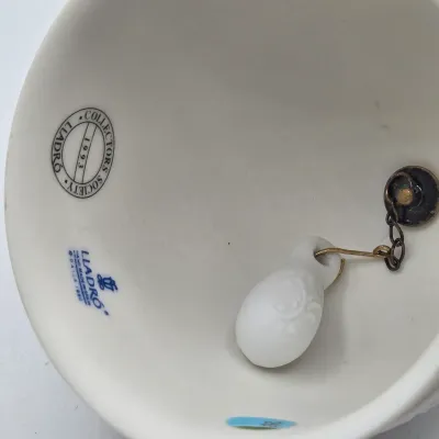 LOT 44L: Three Matte Porcelain Bell Ornaments from the Vintage Lladró Four Seasons Collector’s Society Series