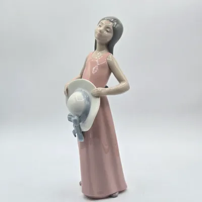 LOT 38L: Retired Lladró "The Dreamer" Porcelain Figurine