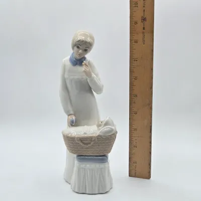 LOT 20L: Tengra Vintage Hand-made Spanish Porcelain Figurine of a Young Mother Standing Next to an Infant in a Bassinet