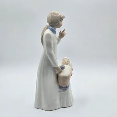 LOT 20L: Tengra Vintage Hand-made Spanish Porcelain Figurine of a Young Mother Standing Next to an Infant in a Bassinet