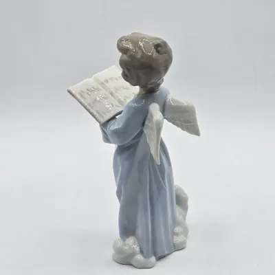 LOT 30L: Lladro "Angelic Voice" Porcelain Figurine