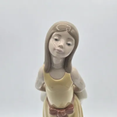 LOT 35L: Lladro "Naughty" Porcelain Figurine