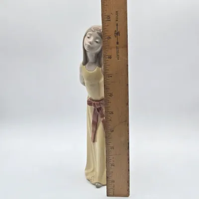 LOT 35L: Lladro "Naughty" Porcelain Figurine