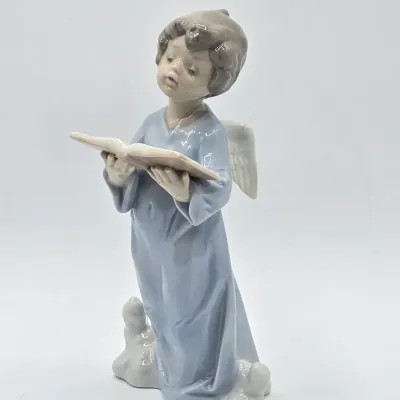 LOT 30L: Lladro "Angelic Voice" Porcelain Figurine