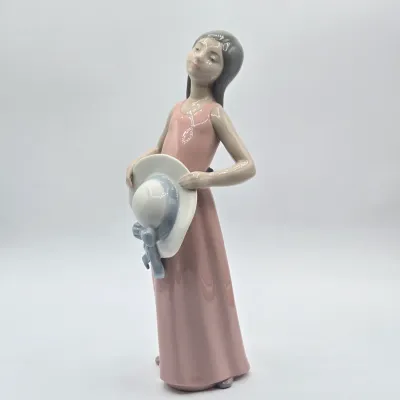LOT 38L: Retired Lladró "The Dreamer" Porcelain Figurine