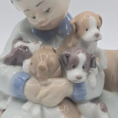 LOT 21L: Retired Lladró "New Playmates" Porcelain Figurine