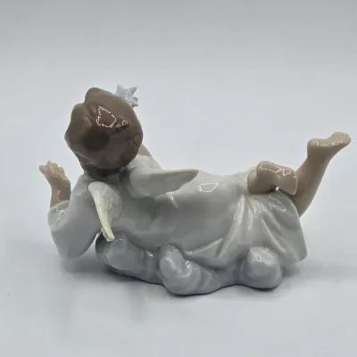 LOT 27L: Retired Lladró "Making a Wish" Angel Porcelain Figurine