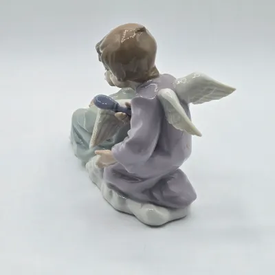 LOT 22L: Retired Lladró "Angel Care" Porcelain Figurine